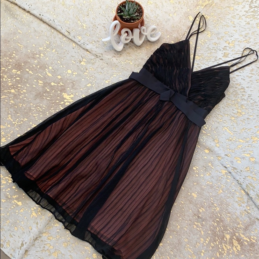 Stunning black dress with pink underlay